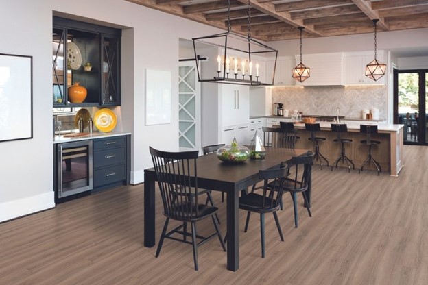 wood look luxury vinyl in open concept farmhouse style dining kitchen area